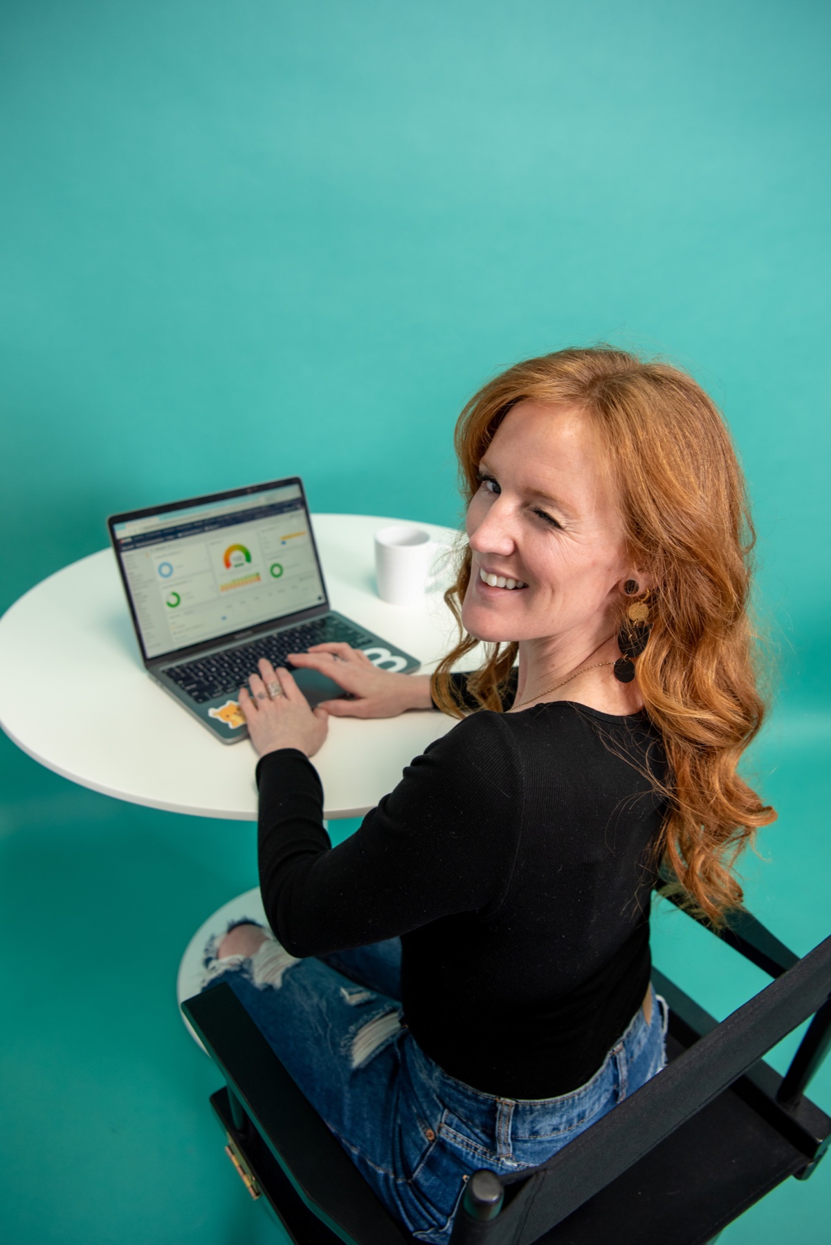 A Boom Business Solutions team member working on a laptop